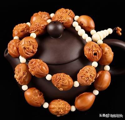 核雕大师精品力作再度来袭 来潘家园领略橄榄核雕的艺术魅力吧！